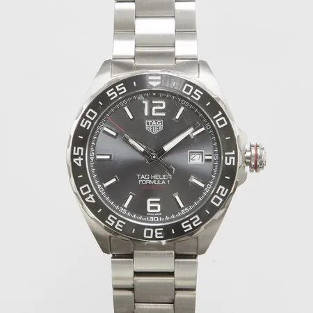Herrur Tag Heuer Formula 1, stål, automatisk, 43mm, ref: WAZ2011, snr: BRW1170, Cal. 5, safirglas, datum, stållänk, viklås med dykförlängning, total längd: 20,5cm, inga tillbehör.
