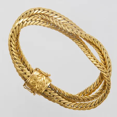 Armband, treradigt, 19,3cm, 18K  Vikt: 28,6 g