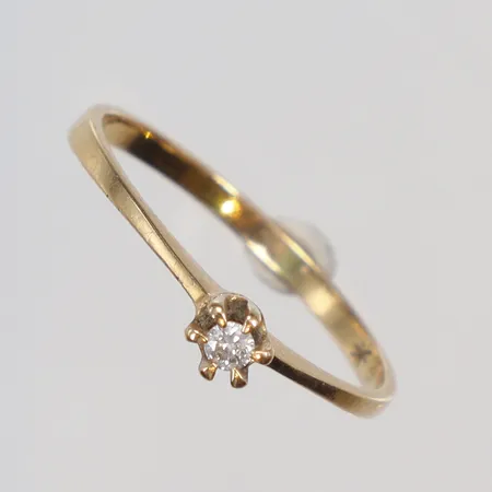 Ring med diamant ca 0,02ct stl 17½, bredd 1-2mm, 18K Vikt: 1,3 g