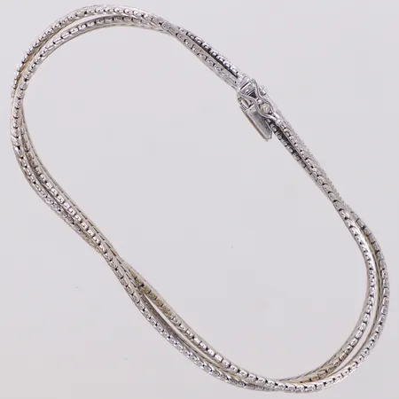 Armband flätat, längd 19cm, bredd 9mm, vitguld, 18K  Vikt: 26,2 g