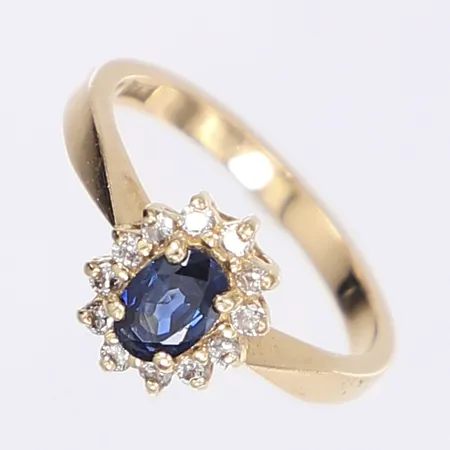 Carmoséring med diamanter 12x ca 0,01ct samt blå sten troligen safir, stl 17, bredd 2-10mm, 18K  Vikt: 3,7 g