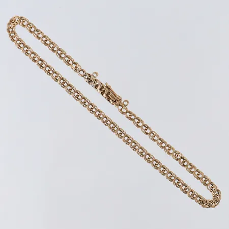 Armband Bismarck, längd 20cm, bredd 3mm, lagningar av annan metall, 14K.  Vikt: 3,9 g