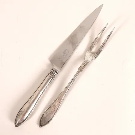 Ett par trancherbestick med stålblad, CG Hallberg, Stockholm 1927, i samtida etui, silver och stålblad, bruttovikt 127,7g 
