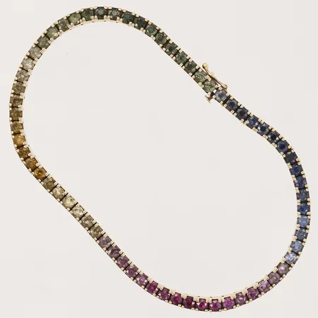 Armband med olikfärgade stenar, 5,29ctv enl gravyr, längd 19cm , bredd 3mm, 18K  Vikt: 13,3 g