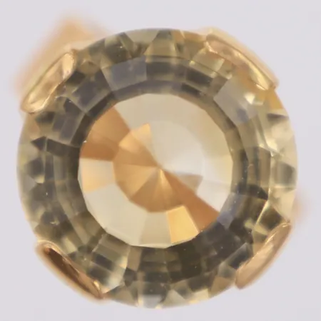 Ring med troligen citrin, stl 17¼, bredd 6,1-18,2mm, Bengt Liljedahl, år 1970, fattningens höjd 12,5mm,  18K  Vikt: 15,8 g