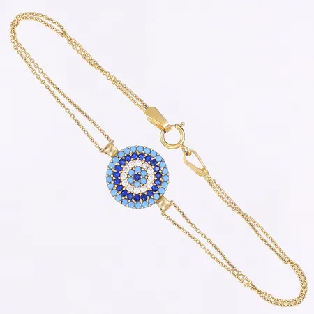 Armband med blå och vita stenar, längd 16cm, bredd 2-12mm, 18K Vikt: 2,6 g