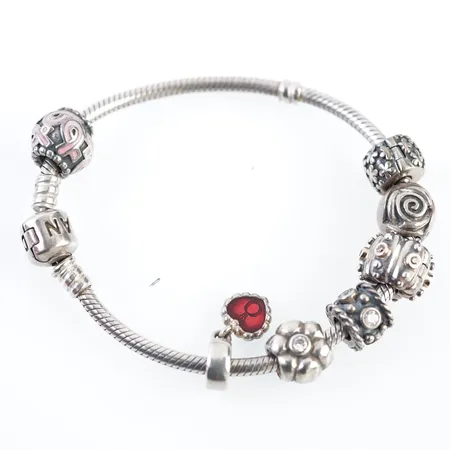 Armband, Pandora, silver m 7 berlocker, 18,5cm, orginaletui Vikt: 37,5 g
