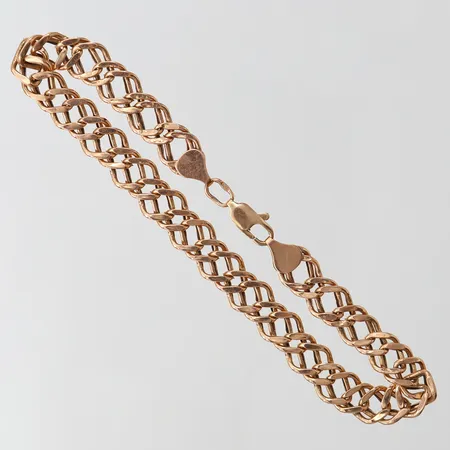 Armband, längd 21cm, bredd 7mm, bucklig, 14K.  Vikt: 6,3 g