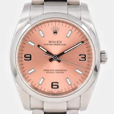 Damur Rolex Oyster Perpetual, Ø 34mm, rosa urtavla, ref.nr.114200, serie.nr. 42EJ2051, automatisk, stållänk ca 16cm inklusive uret, små repor finns, 3 extra länkbitar medföljer, certifikat från Nymans år 2014, box, ytterkartong