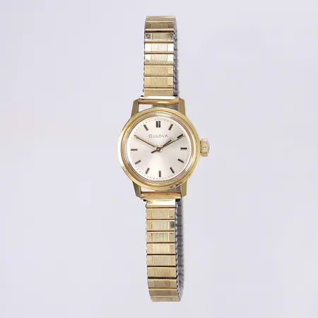 Damur Bulova, Ø21mm, manuell, stål, flexlänk stål, smärre bruksslitage, repigt glas, tickar men ej testad för tidshållning