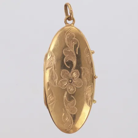 Hänge/medaljong med blomdekor, längd 57,4mm, bredd 23,7mm, öppningsbar, små bucklor, 18K  Vikt: 14,2 g