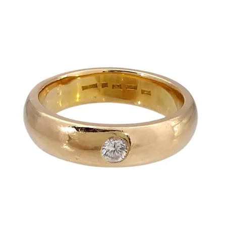 Diamantring, 18K guld, Diamant 0,15ct, Guldsmed Björn Nilsson AB (GBON), Kristianstad, Ø20¼ mm, bredd 6 mm Vikt: 12,9 g