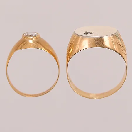 Ringar 2 st, skador finns, 18K 6,6g.