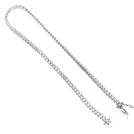 Armband m diamanter 100st x ca 0,005ct/styck, vitguld, 18cm, bredd 2,5mm, 18k Vikt: 6 g