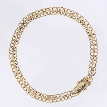 Armband X-länk, kistlås, längd 21cm, bredd 6mm, 18K, åldersbetingat slitage Vikt: 11,2 g