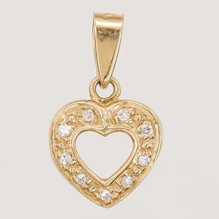 Hänge i form av ett hjärta med diamanter 9 x ca 0,005ct , höjd inkl. ögla: 16mm, bredd: 9mm, GFAB, 18K guld.  Vikt: 0,7 g