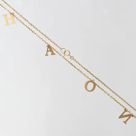 Collier med integrerade hängen, längd ca 46cm, bredd 1,5-11mm, ostämplad, 18K Vikt: 3,8 g