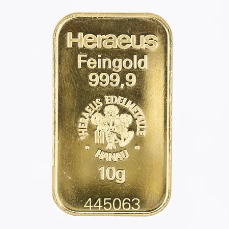 Guldtacka Heraeus, finhalt: 999.9, serie-nr: 445063, bruten plombering, repor, 24K guld.  Vikt: 10 g