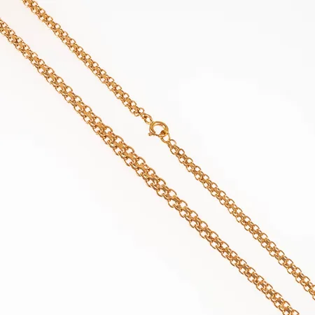 Collier, x-länk i 18K guld. Det är 44 cm långt, 3,5 - 5 mm brett och väger 9,6g. Fint skick. Springring. 