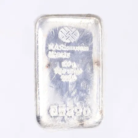 Silvertacka, K.A. Rasmussen, Norge, 50x30mm, serienummer A5290, finsilver 999/1000 Vikt: 100 g