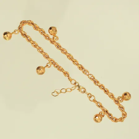 Armband med berlocker, längd ca 21,5cm, bredd 3-10mm (defekt länk, 1 berlock saknas) 18K, 4,7g 