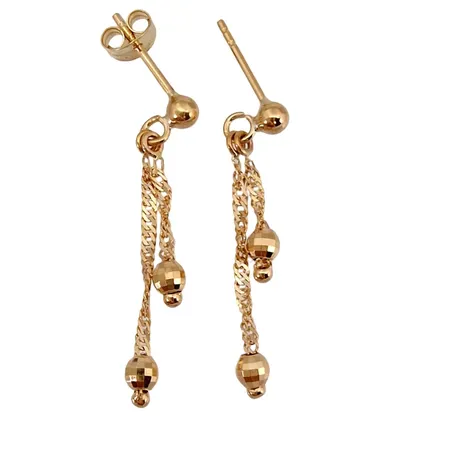 Örhängen, 18K guld, modell med hängande klot, längd 28 mm, klotens diameter 3 mm, en plopp saknas, fint skick Vikt: 1,1 g