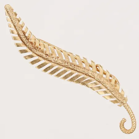 Brosch i form av ett blad, längd: 42mm, bredd; 6mm, 18K guld.  Vikt: 1,6 g