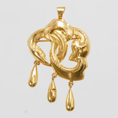 Hänge/brosch, längd ca 40mm, bredd 28mm, bucklig, klämd, 18K Vikt: 3,5 g