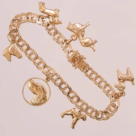 Armband Bismarck, med 6 Berlocker, 18,5cm, bredd 6,2mm, 18K, 16,8g.