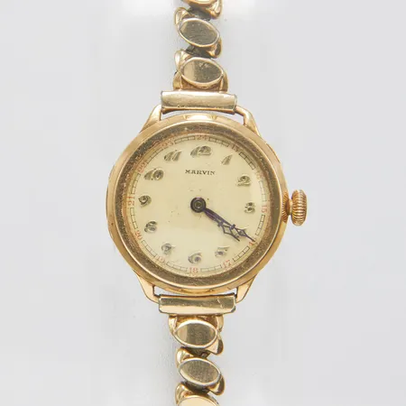 Damur Marvin 14K, Ø 25mm, manuell, monogram, flexband i metall, inga tillbehör. 