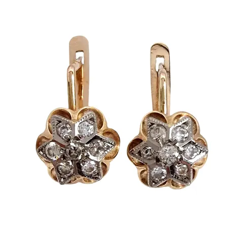 Diamantörhängen, 14K guld, dekor i vitguld, Diamanter 14 x ca 0,03ct, diameter 10 mm Vikt: 5,1 g