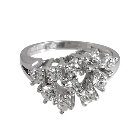 Diamantring, 18K vitguld, Diamanter 10 st - totalt 0,46ct (stämplat på skenans insida), Guldvaruaktiebolaget G. Dahlgren & Co Ab (Gd&Co), Malmö, svensk kontrollstämpel, Ø16¼ mm, bredd 2-11 mm, fint skick, borttag av gravyr ingår Vikt: 4,1 g