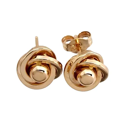 Örhängen Knutar, 18K guld, storlek 8x8 mm, några små ojämnheter, en plopp saknas Vikt: 0,9 g
