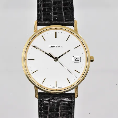 Herrur Certina, Ø 33 mm, 14K, quartz, datum, graverad boett, svart läderband, fungerar ej vid inlämning, box