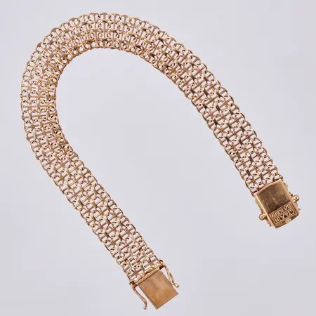 Armband X-länk med stav, längd: ca 19cm, bredd: ca 10mm, Jo-Ans Guld Johansson & Andersson år 1970, 18K Vikt: 12,5 g