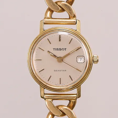 Damur, Tissot, Quartz, Ø22mm, 18K, plexiglas slitet, länk i 18K Pansar, 19-20cm, bredd 10,4mm, bruttovikt, 53,3g.