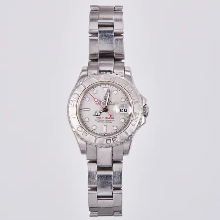 Damur Rolex Yacht-master, stål/platina, 28mm, ref 169622, serienr: F182840, cal 2235, verknummer: A1660495, boettnr: 2270, länk ref: AD8/28730, bruk skick, slapp länk, repig, länk, boett, certifikat: september 2004, Nymans ur 1851 Västerås-Stockholm, folder, manual, etui, extra länk 