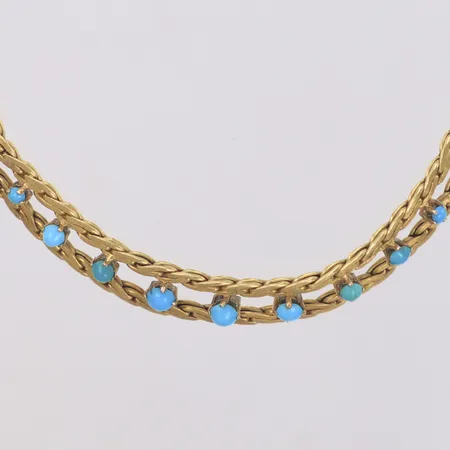 Collier med turkosa stenar, längd ca 44cm, bredd 5,3-9mm, halvstelt, 18K  Vikt: 37 g