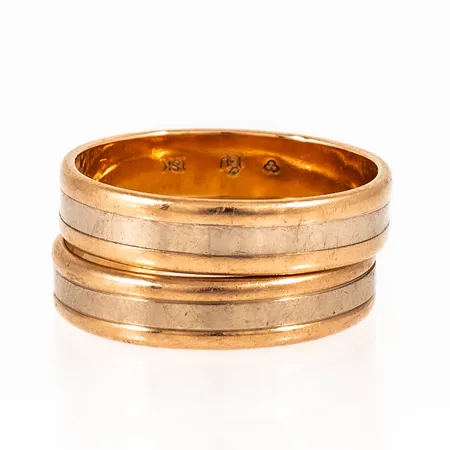 Graverat guld i 18K. Vikt: 9,8g.