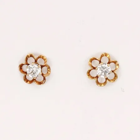 Ett par örhängen i form av blommor med vita stenar, höjd: 11mm, bredd: 6mm, saknar snurrebussar, 18K guld.  Vikt: 0,4 g
