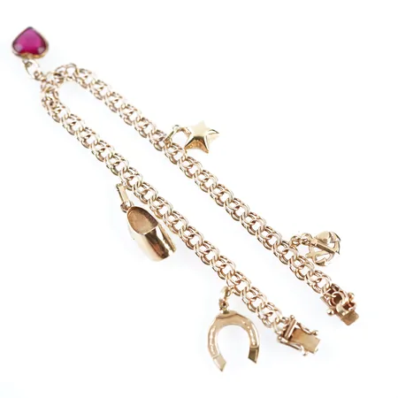 Armband bismarck m 5 berlocker, 19cm, bredd 4mm, 18k, fint skick Vikt: 11 g