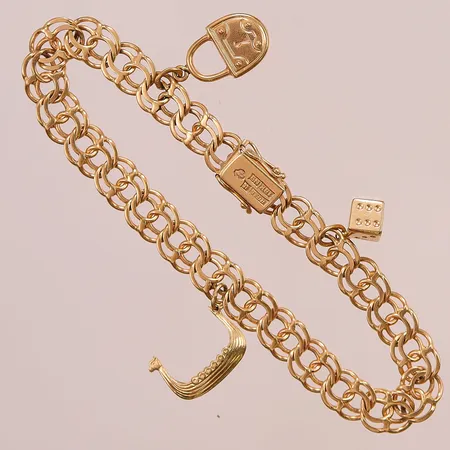 Armband 19,5cm, med 3 Berlocker, 2 är i 14K resten 18K 17,7g.