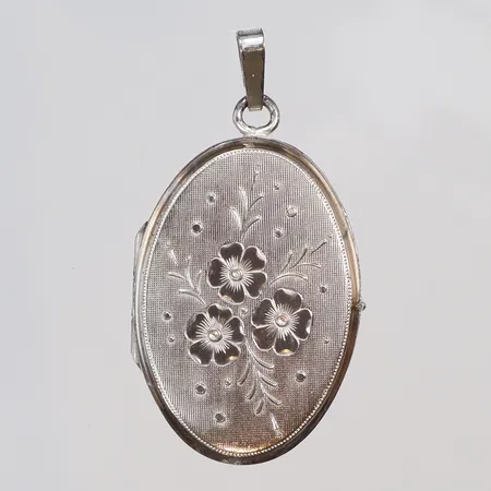 Medaljong dekor av blommor 22x40mm, silver 835/1000  Vikt: 12,2 g