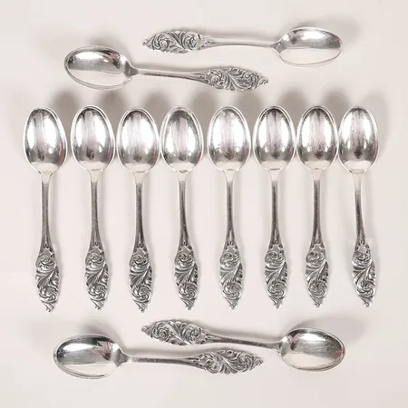 Tolv kaffeskedar, norska stämplar, längd 11,5cm, slitage, silver. Vikt: 126,1 g