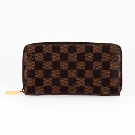 Plånbok/Organizer, Louis Vuitton, Zippy Wallet, Damier Ebene, modell: N41661, datumkod: GI2107. Mått 20 x 11 x 2,5 cm. Originallåda. Kvitto från 2017-06-21. Beslag med färgbortfall. 