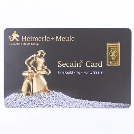 Guldtacka Heimerle + Meule 1845, secain card, längd 15mm, bredd 8,6mm, 24K  Vikt: 1 g