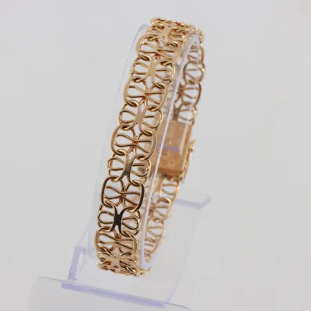 Armband  längd ca 18 cm, bredd 12 mm, 18k. Vikt: 22,2 g