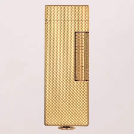 Tändare Dunhill, 65x22mm, förgylld metall, märkt US. RE 24163, fungerar ej