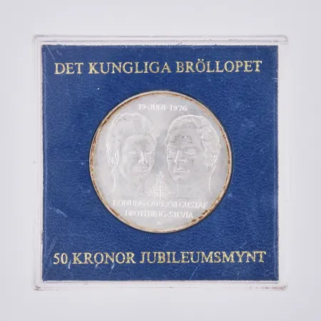 Jubileumsmynt, Nominellt värde 50kronor, det kungliga bröllopet, 19 Juni 1976, Konung Carl XVI Gustaf Drottning Silvia, silver Vikt: 27 g