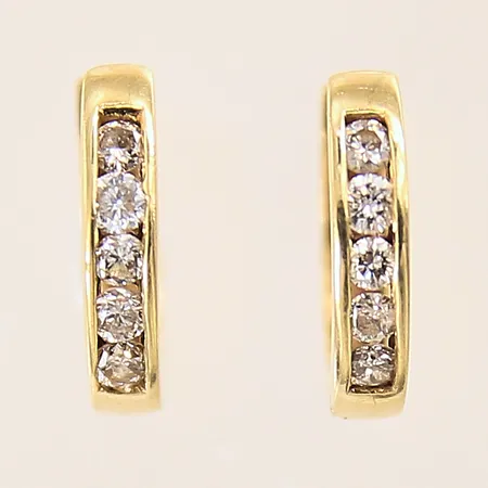 Ett par örhängen med diamanter 10 x ca 0,02ct, Ø11mm, 18K  Vikt: 1,9 g